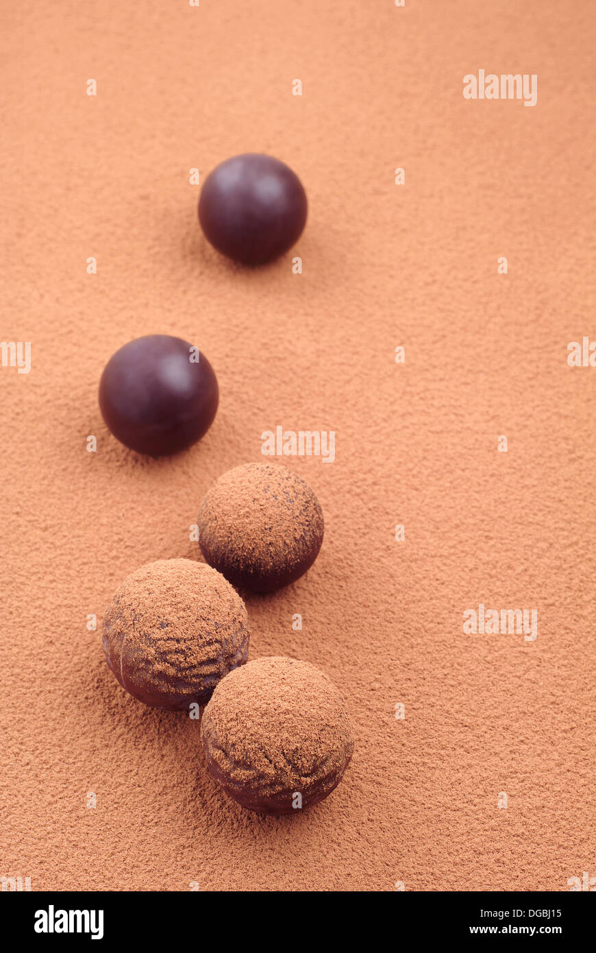 Background with round chocolate candy Stock Photo - Alamy