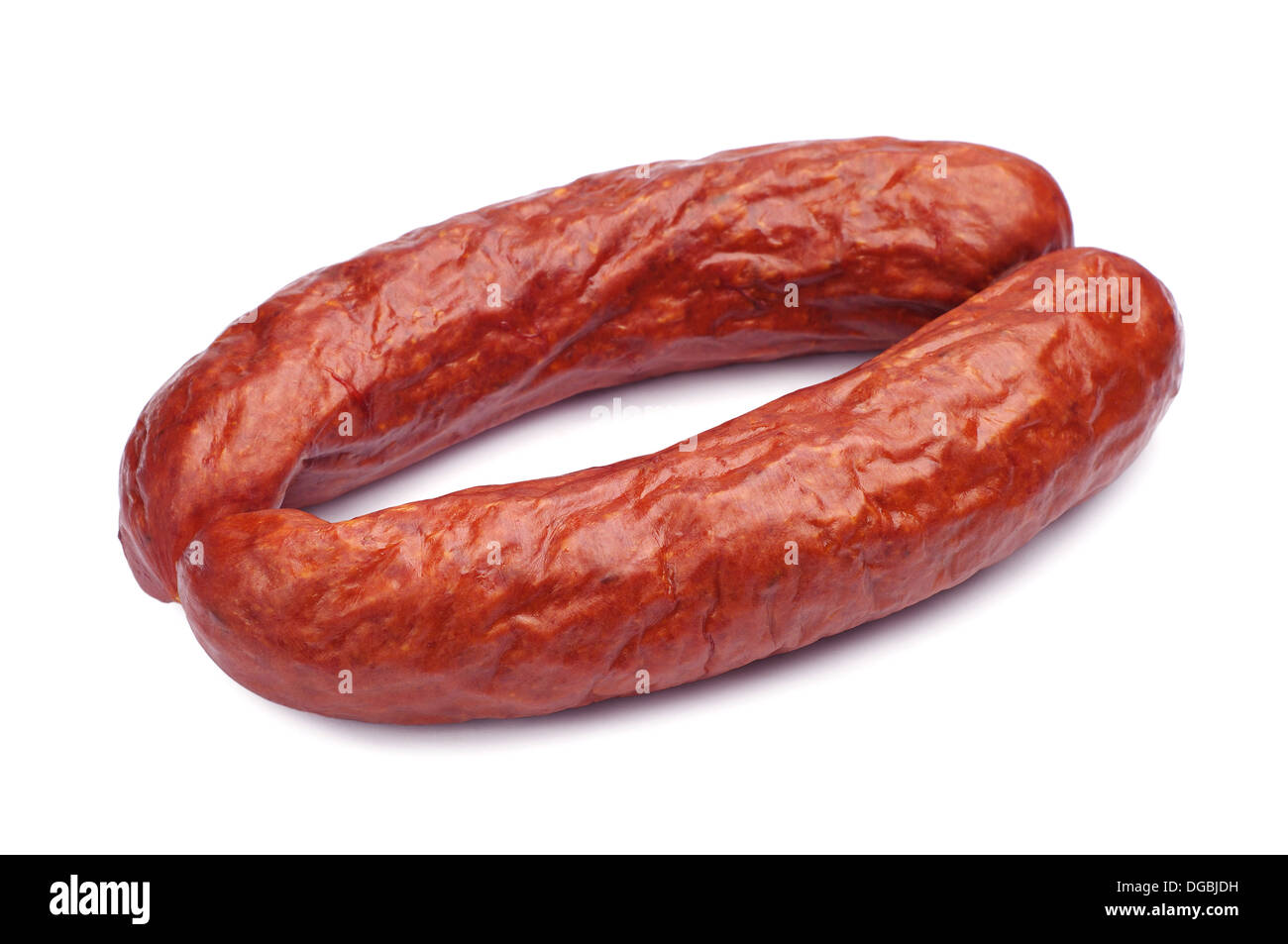 Smoked sausage on a white background Stock Photo