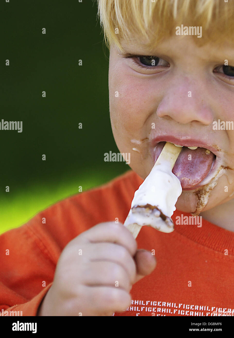 Toddler eating ice cream Stock Photo Alamy