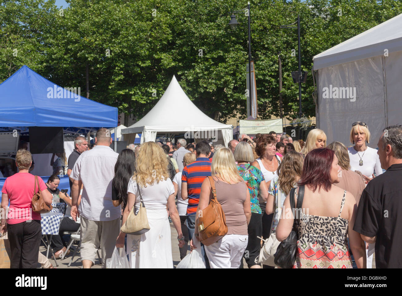Crowds of visitors in Victoria Square, Bolton during the August Bank Holiday 2013 Bolton Food festival. Stock Photo