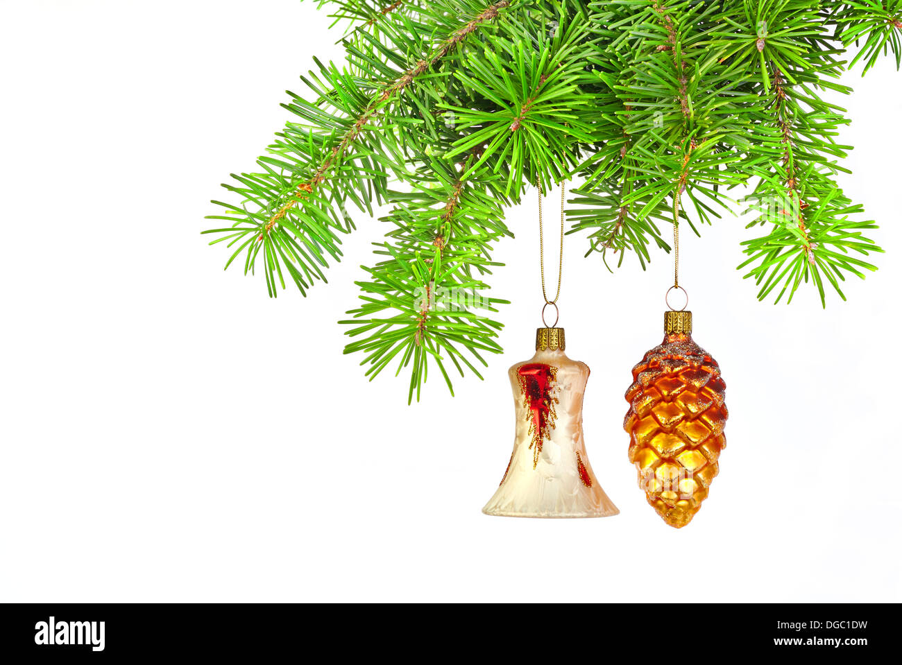 Bell and cone toys with Christmas tree isolated on white background Stock Photo
