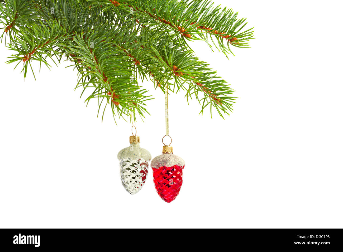 New year toys. Red and white toy cone on Christmas tree Stock Photo