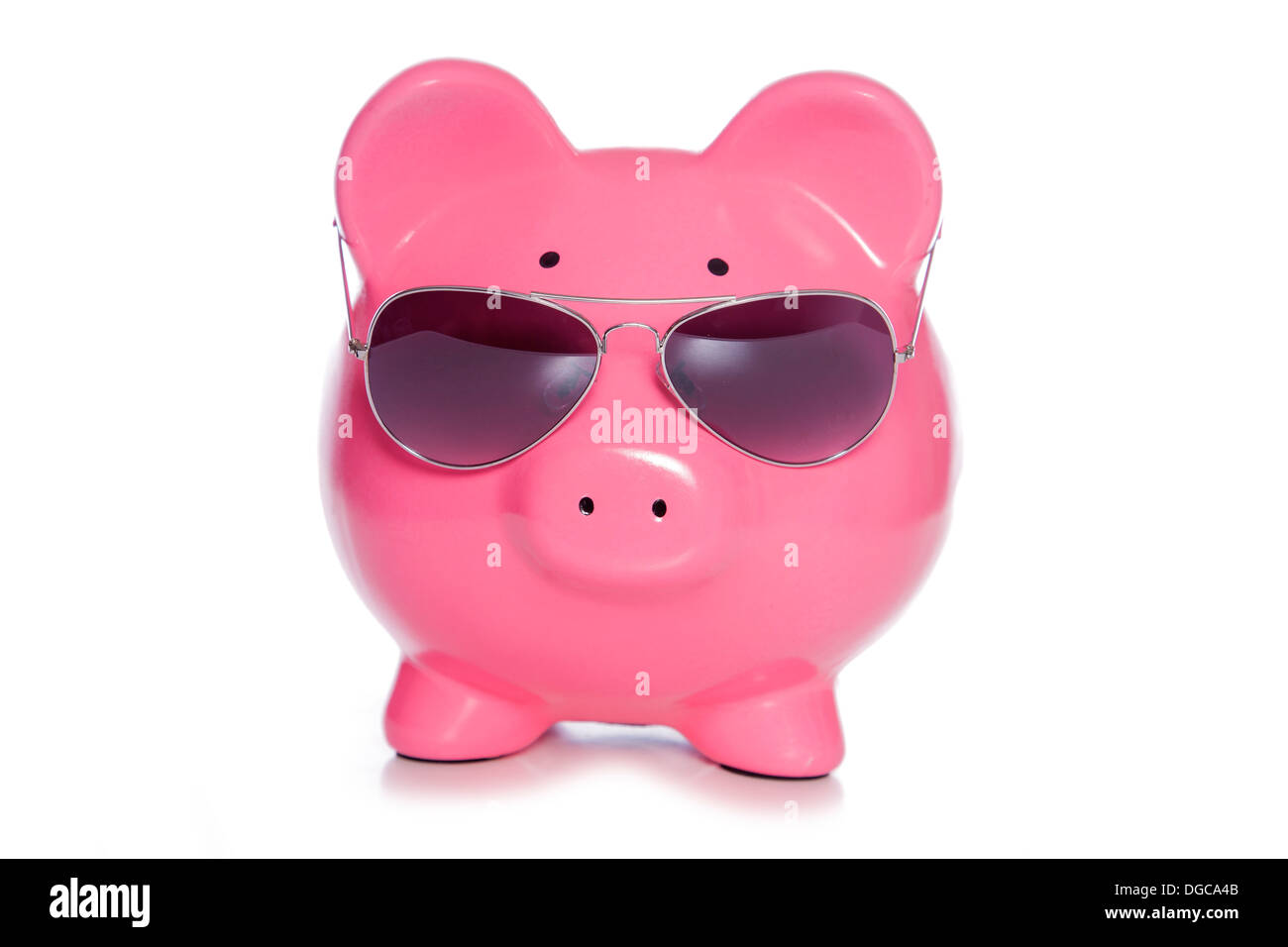 Saving for a holiday piggy bank studio cutout Stock Photo