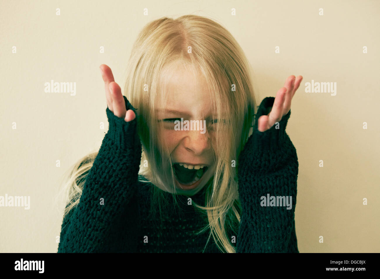 Young girl screaming, close up Stock Photo
