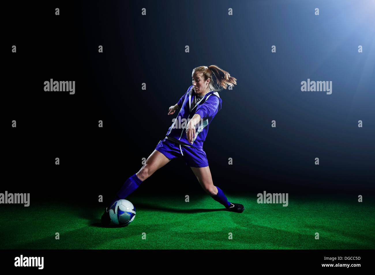 Young female soccer player dribbling ball Stock Photo 61738585 Alamy