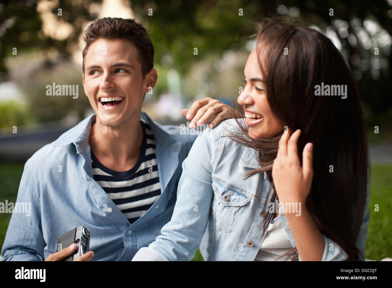 Young couple laughing together Stock Photo