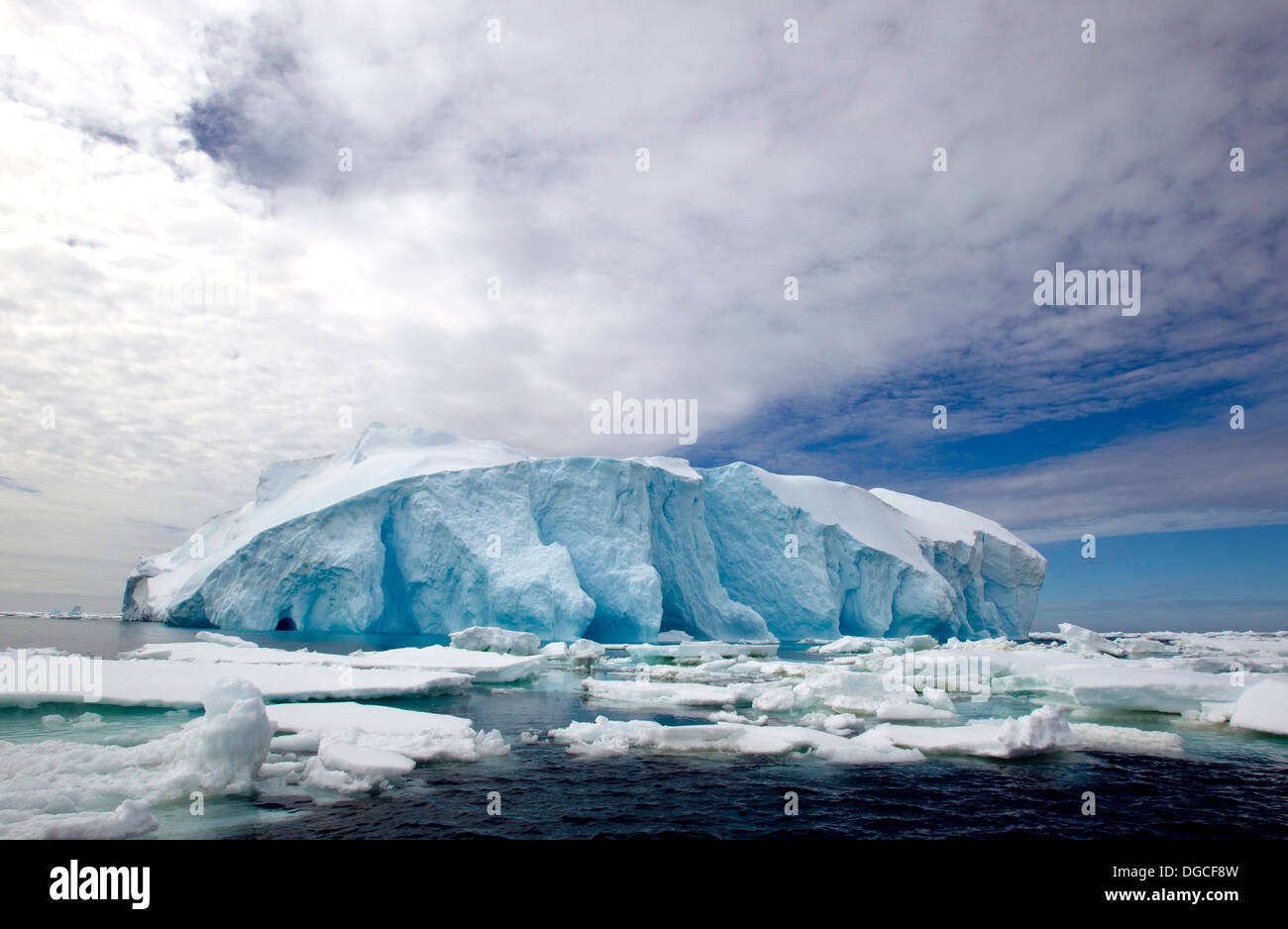 Iceberg in ice floe in the southern ocean, 180 miles north of East Antarctica, Antarctica Stock Photo