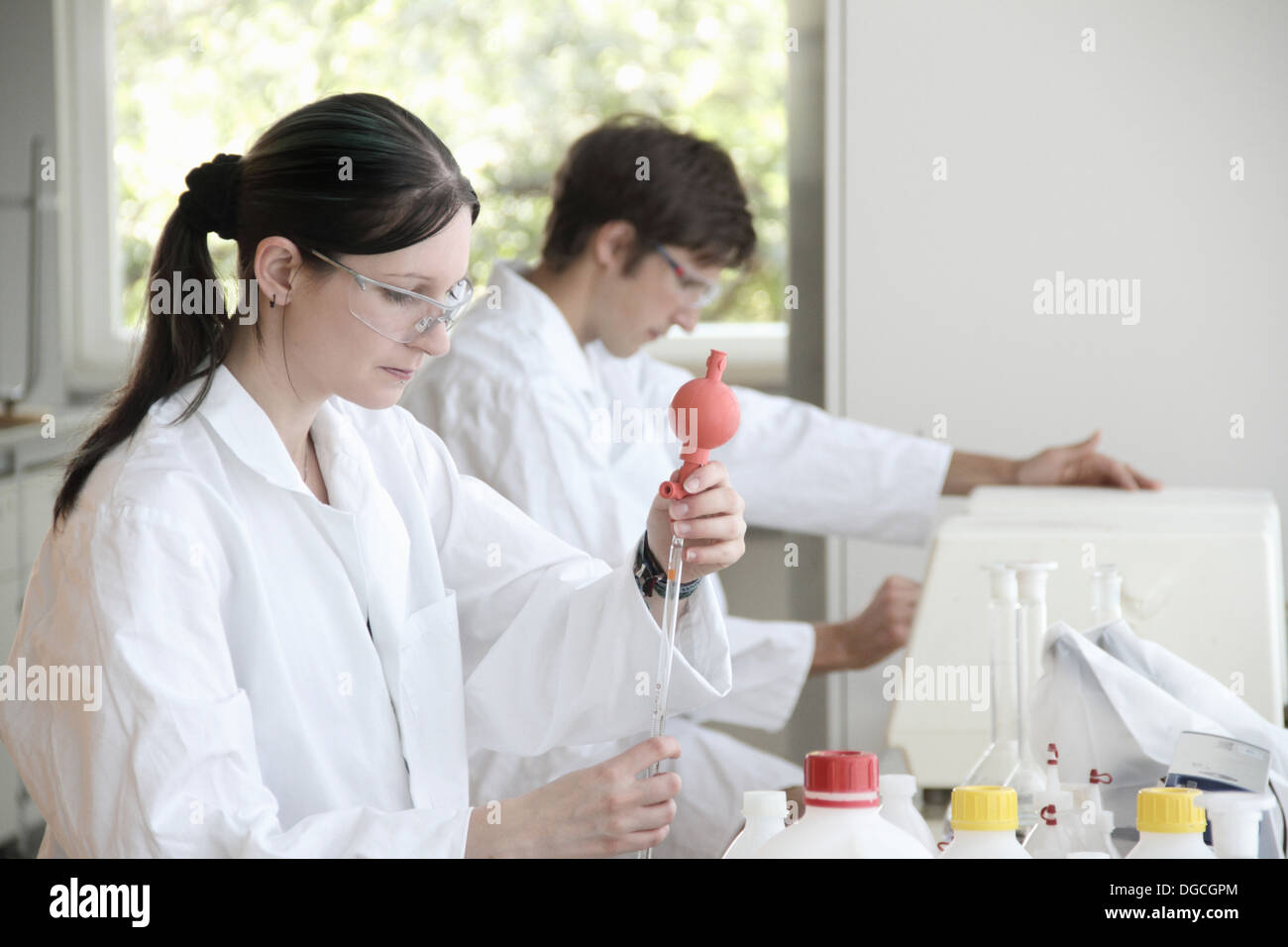 Chemistry students at work in lab Stock Photo
