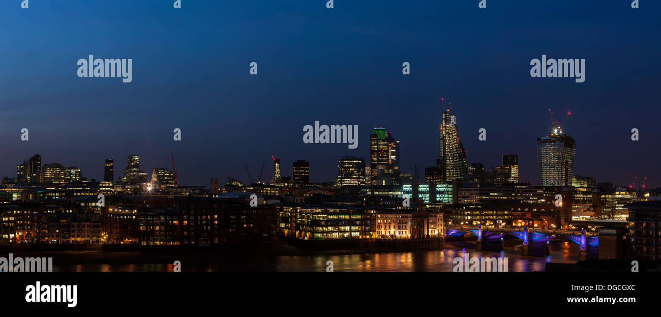 dusk or night shot of London looking north across the Thames Stock Photo