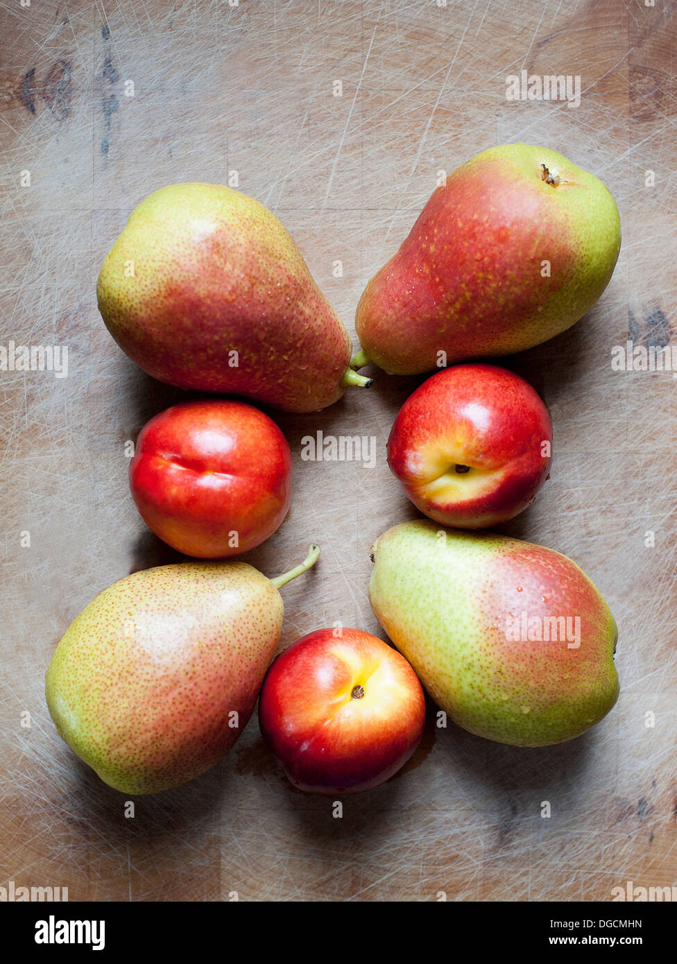 Peaches and pears, overhead view Stock Photo Alamy