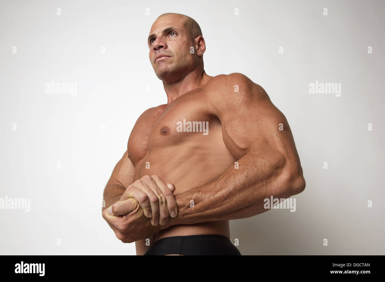 Tough Strong Man In His 30s Striking A Bodybuilder Pose Stock Photo Alamy Tough Strong Man In His 30s Striking A Bodybuilder Pose Stock Photo Alamy