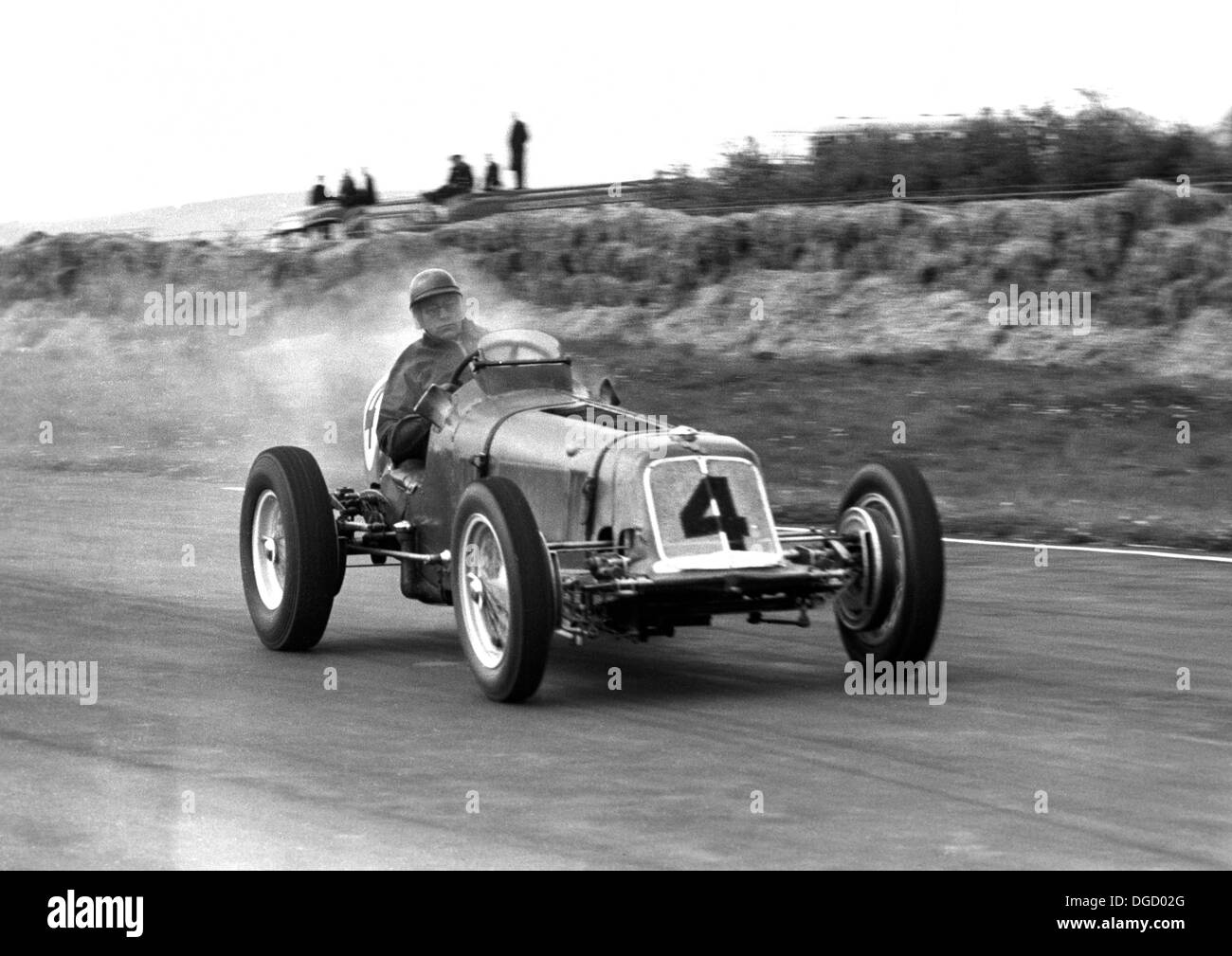 Bob Gerard driving a smoking ERA in the Festival of Britain Trophy, Goodwood, England 1951. Stock Photo