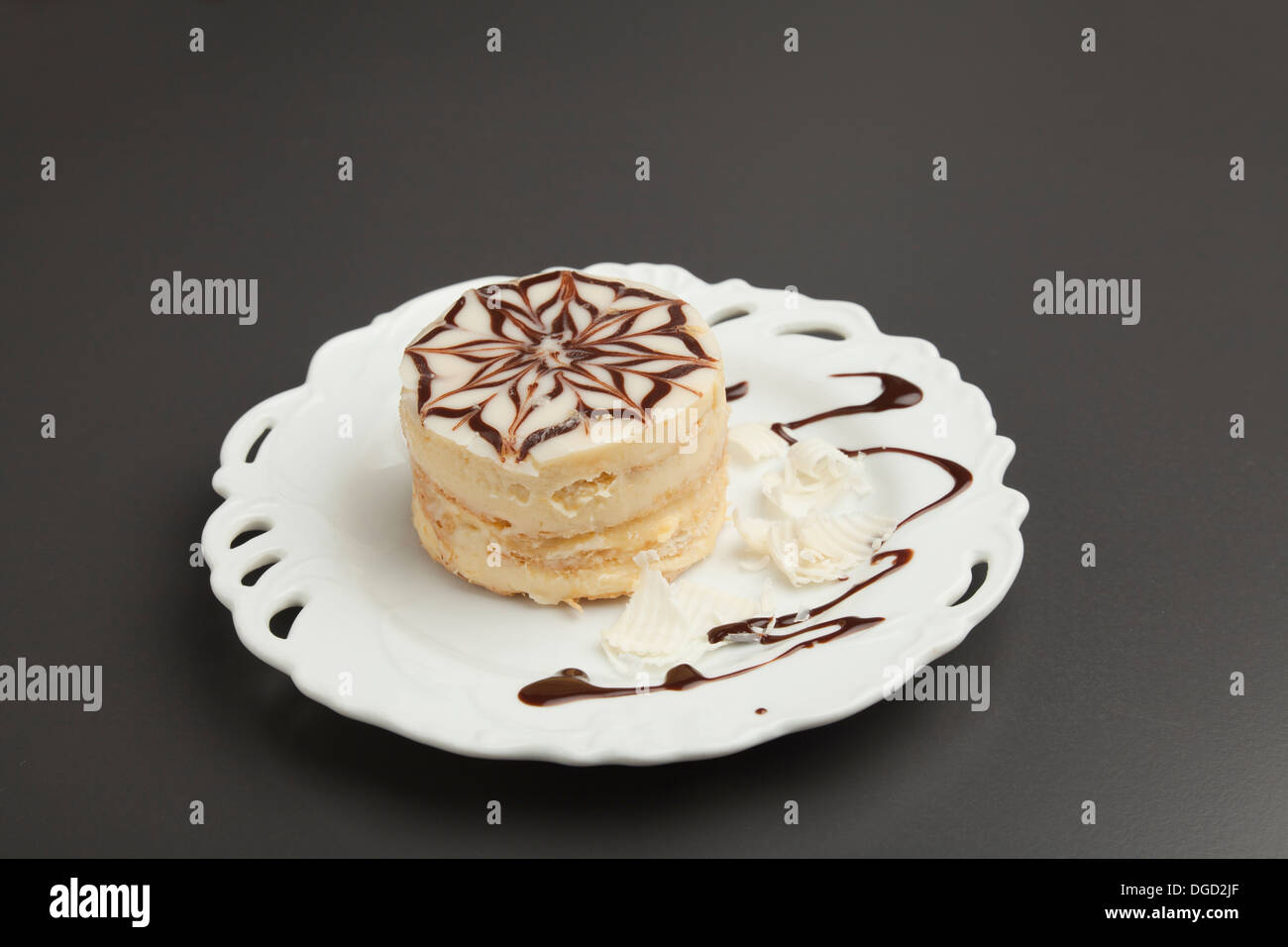 cake on the white plate with decoration Stock Photo