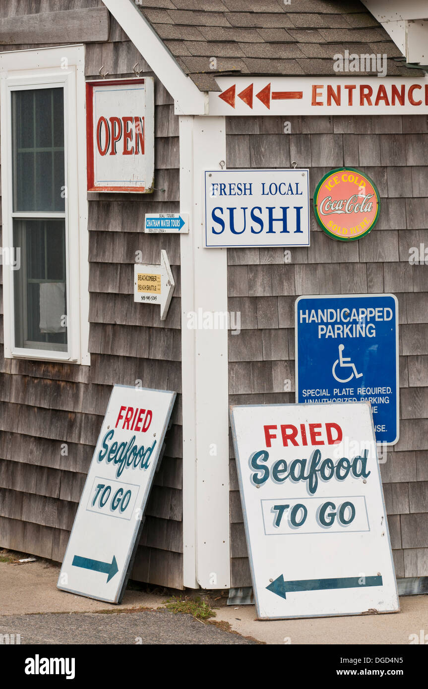 Well signed fried seafood vendor's hut at Chatham Harbor, MA. Stock Photo