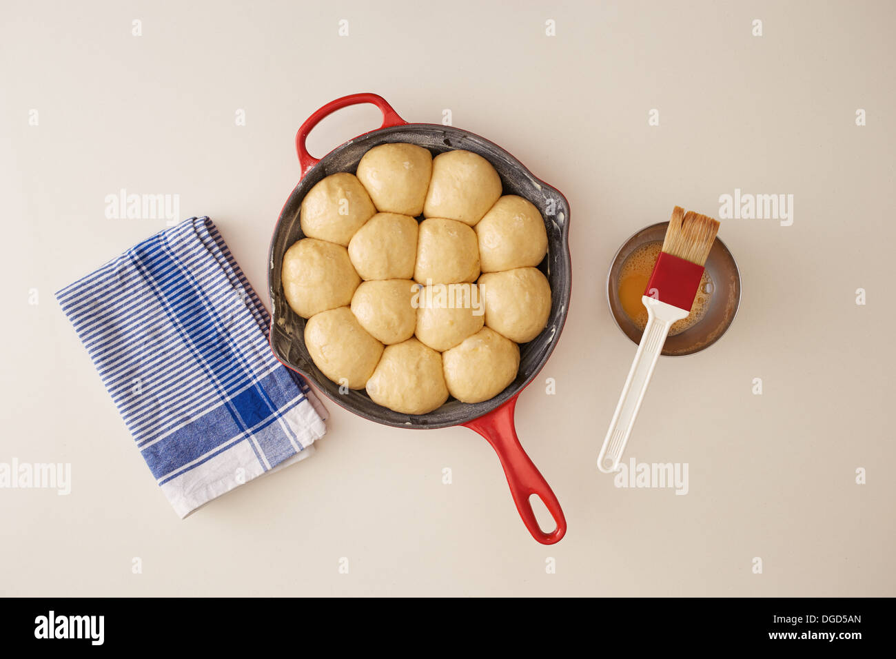 Raw brioche balls in a pan Stock Photo
