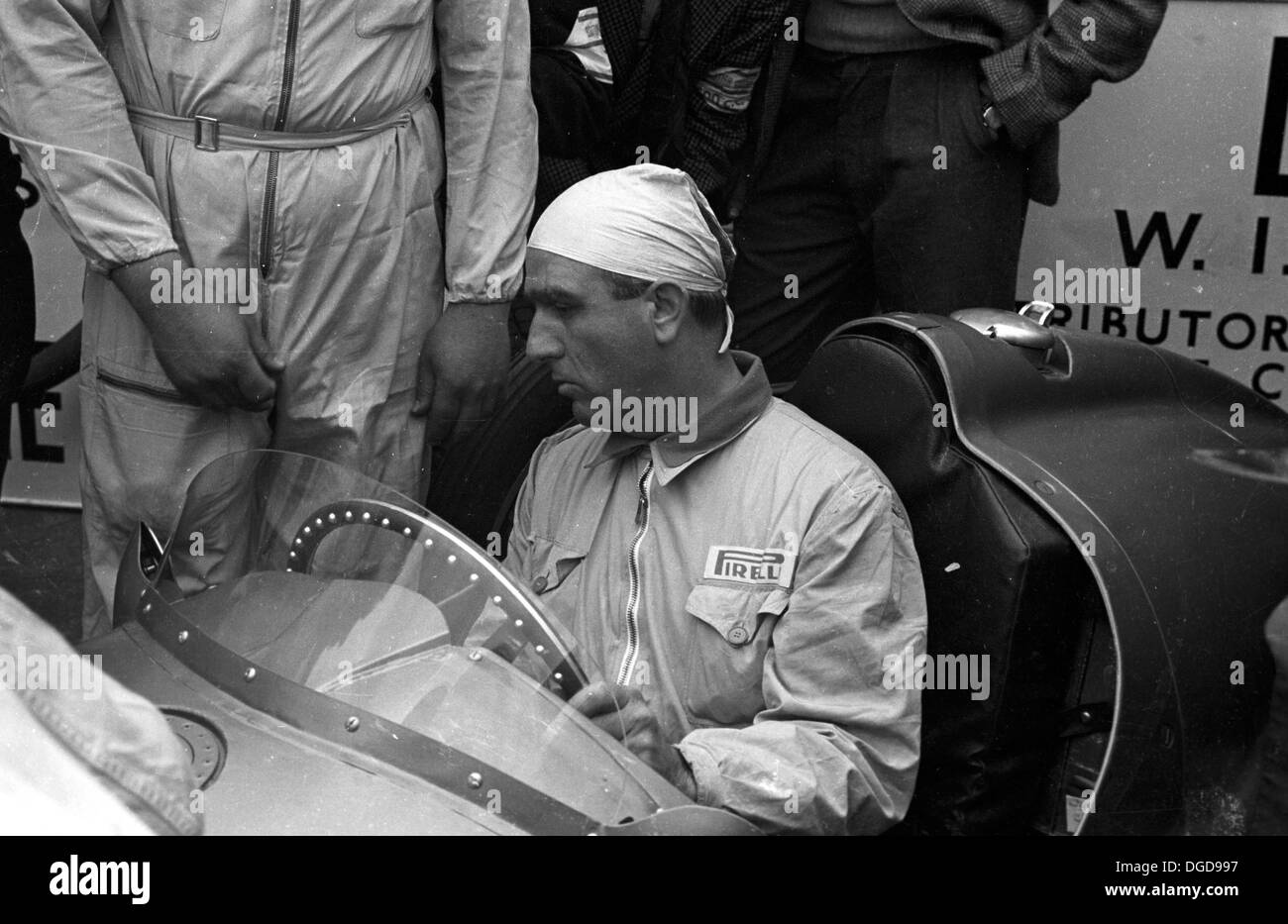 Nino Farina reigning World Champion tries the V16-cylinder British BRM. British Grand Prix, Silverstone, England 14th July 1951. Stock Photo