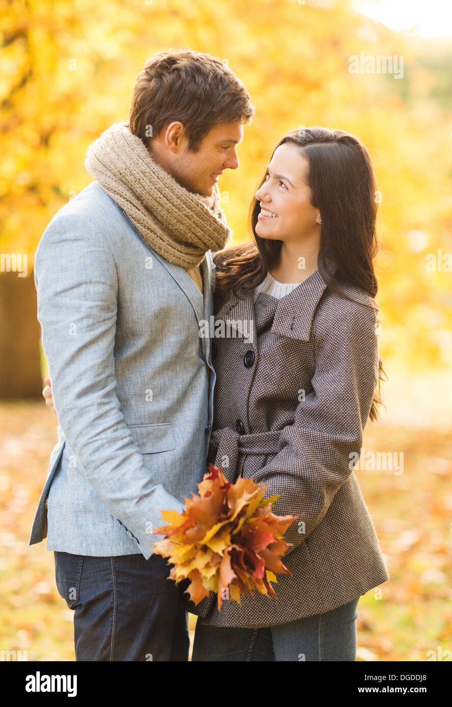 romantic couple kissing in the autumn park Stock Photo - Alamy