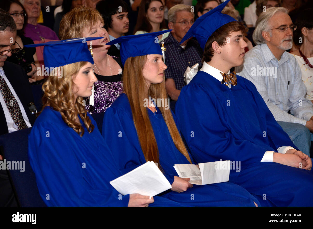 Home school high school graduates attend a graduation ceremony for graduates and their families