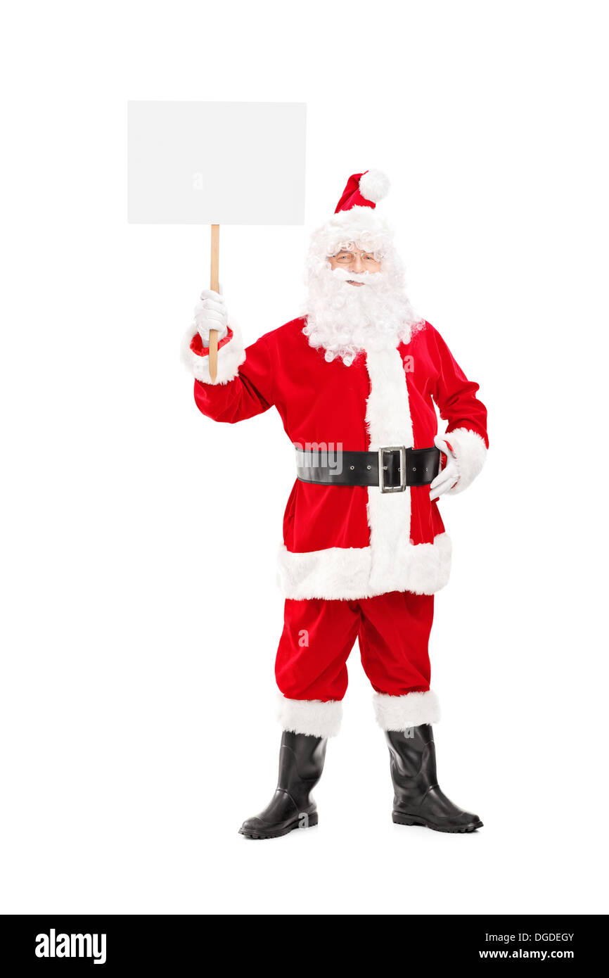 Full length portrait of a smiling Santa Claus holding a blank panel ...