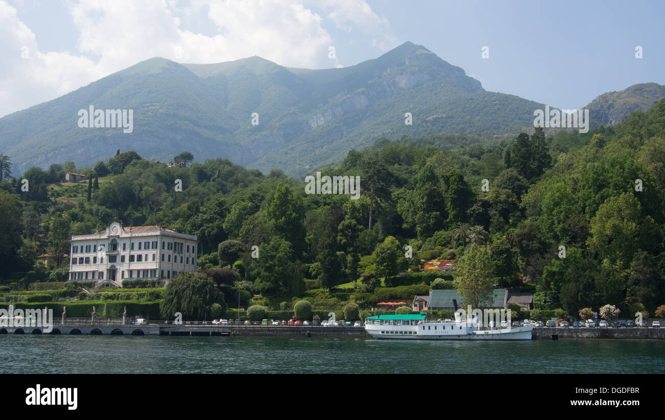 Villa Carlotta and a passenger/ferry boat at Tremezzo, Lake Como, Lombardy, Italy. Stock Photo