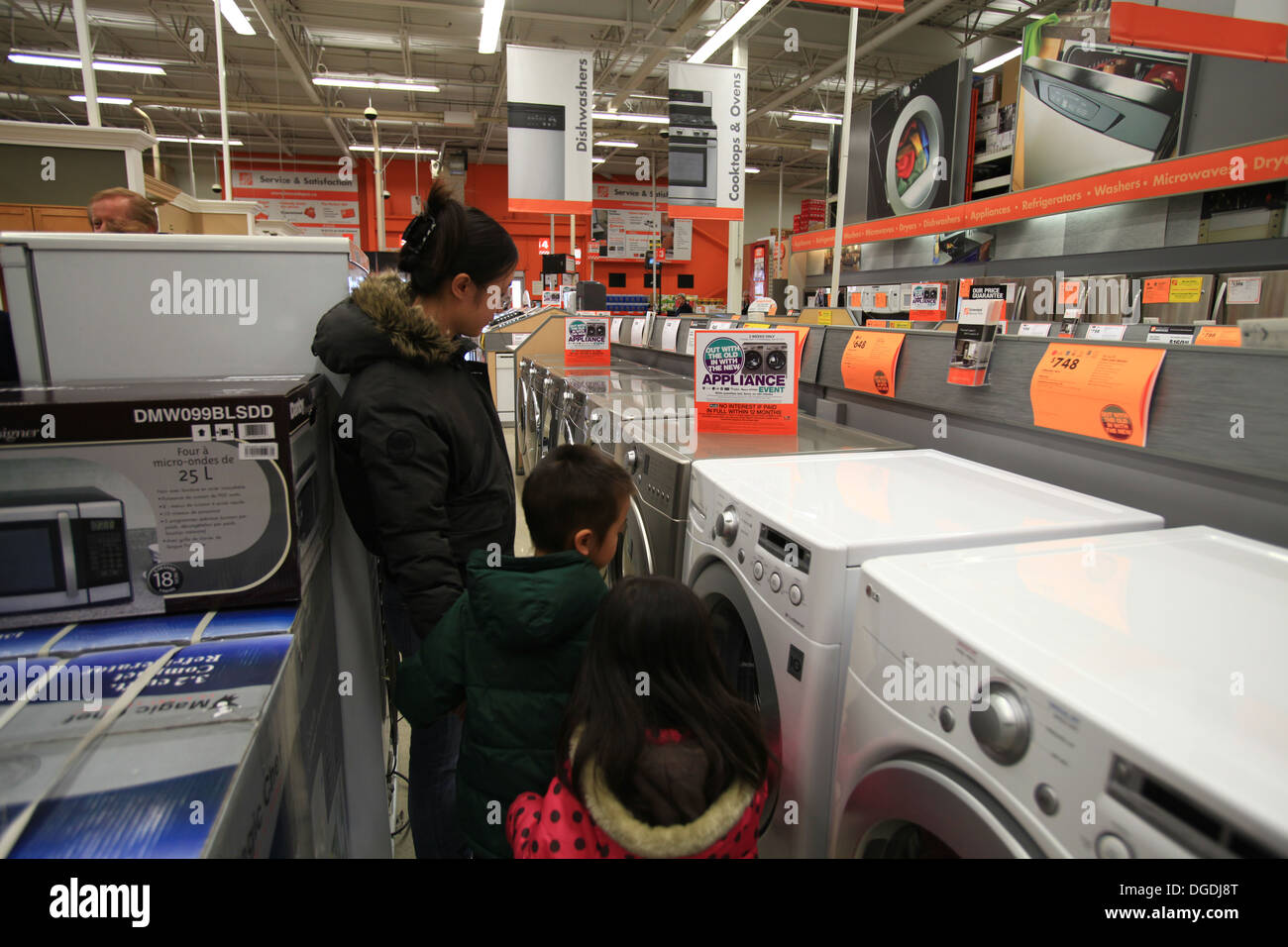 Electric washing machines and dryers for sale in The Home Depot, Kitchener, Ontario, Canada Stock Photo