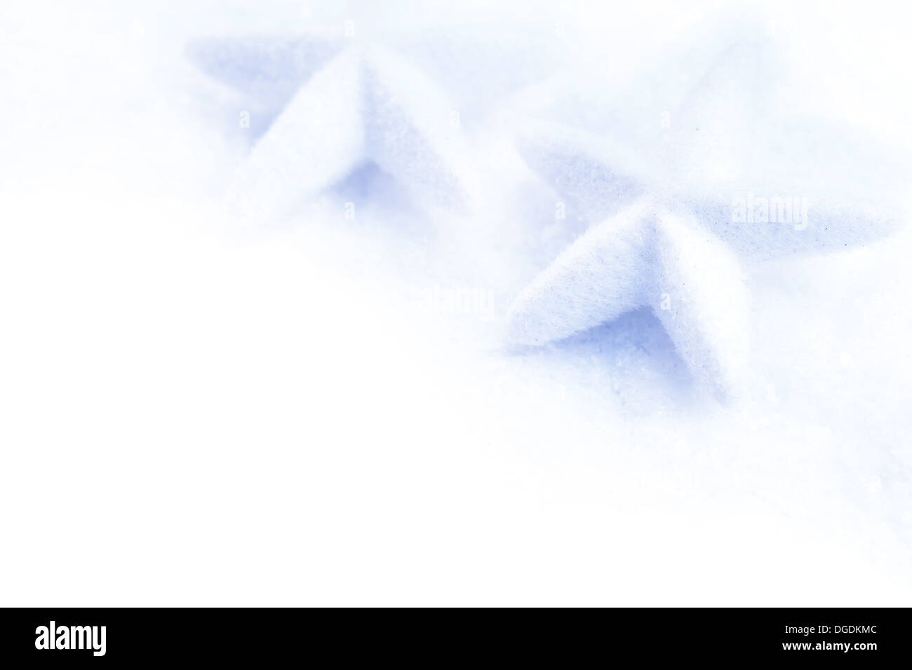 stars christmas decoration in white snow isolated Stock Photo