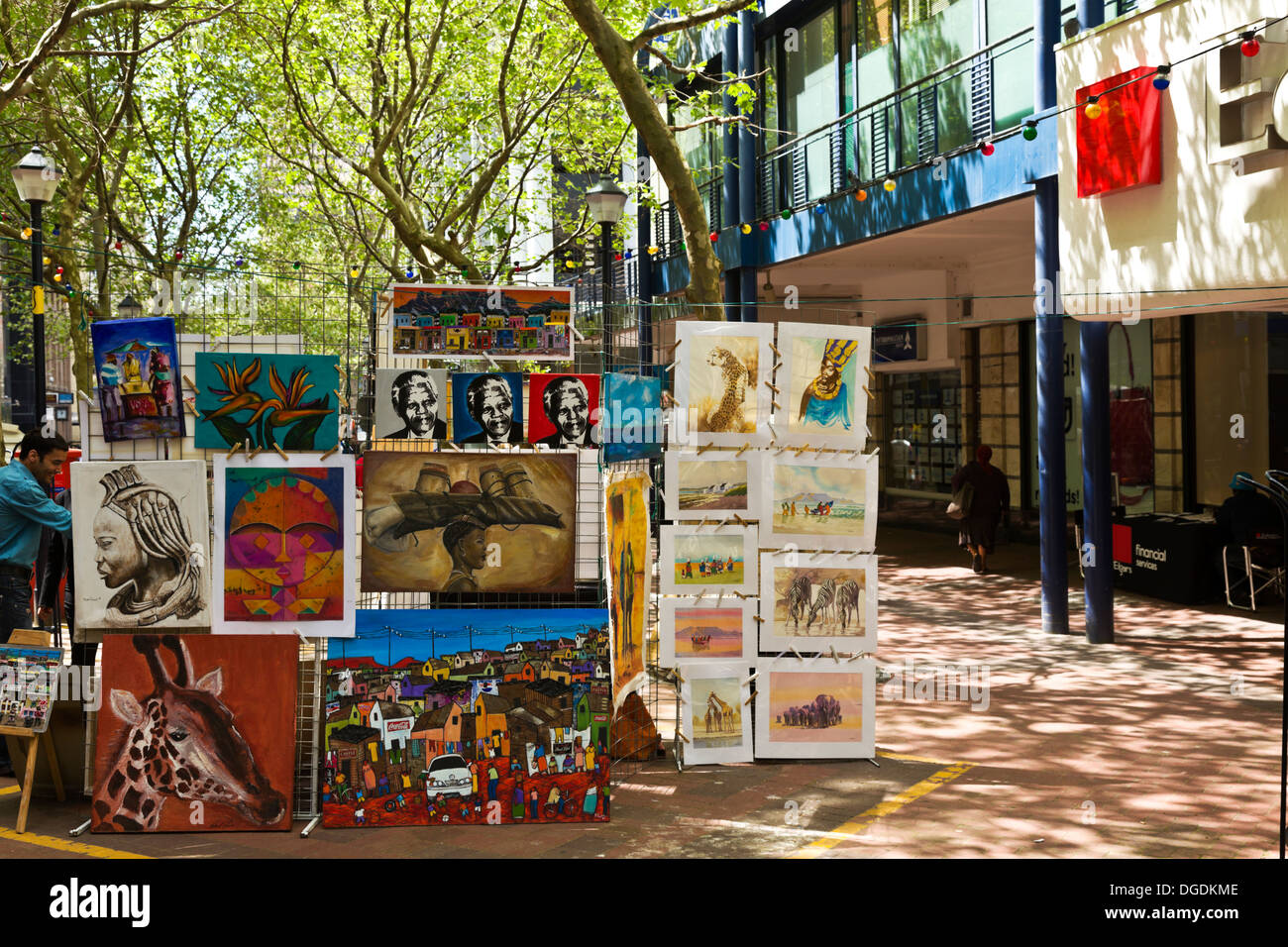 An artist displays painting for sale in St Mall near Longmarket