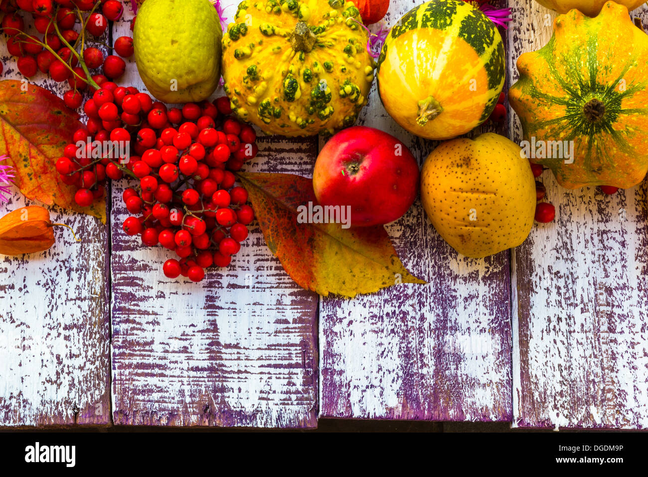 Autumn setting on the wooden table with fruits and vegetables Stock ...