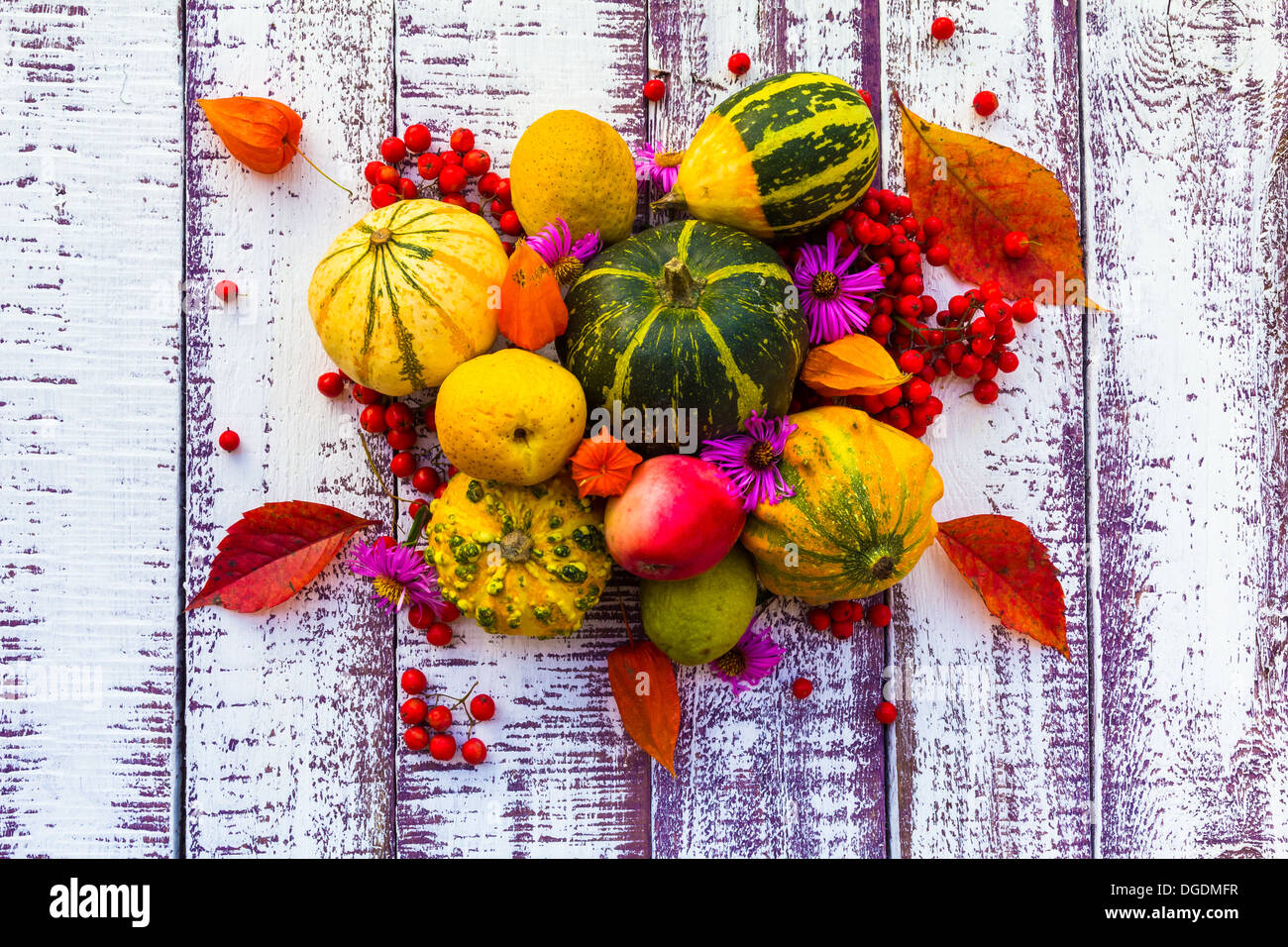 Autumn setting on the wooden table with fruits and vegetables Stock ...