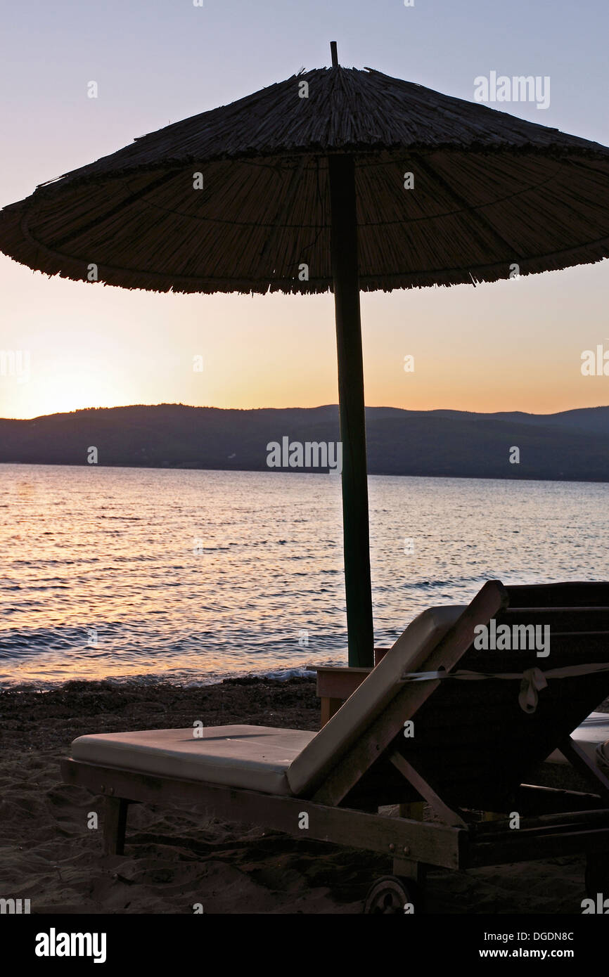 Sunset at Agia Eleni Beach on the Greek Island of Skiathos in the Aegean Sea. Stock Photo