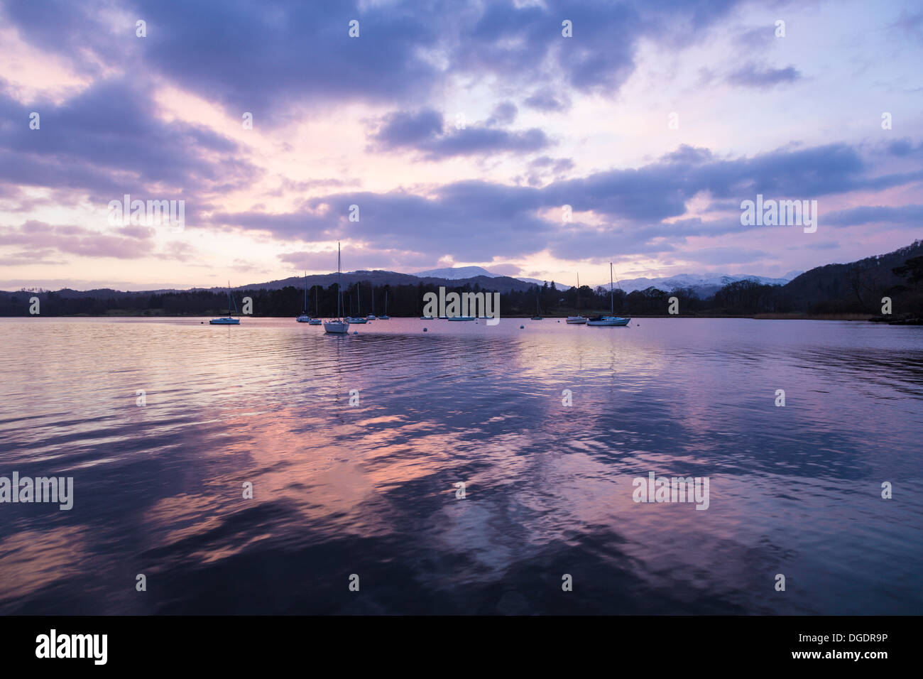Lake Windermere and moored yachts at sunset Stock Photo