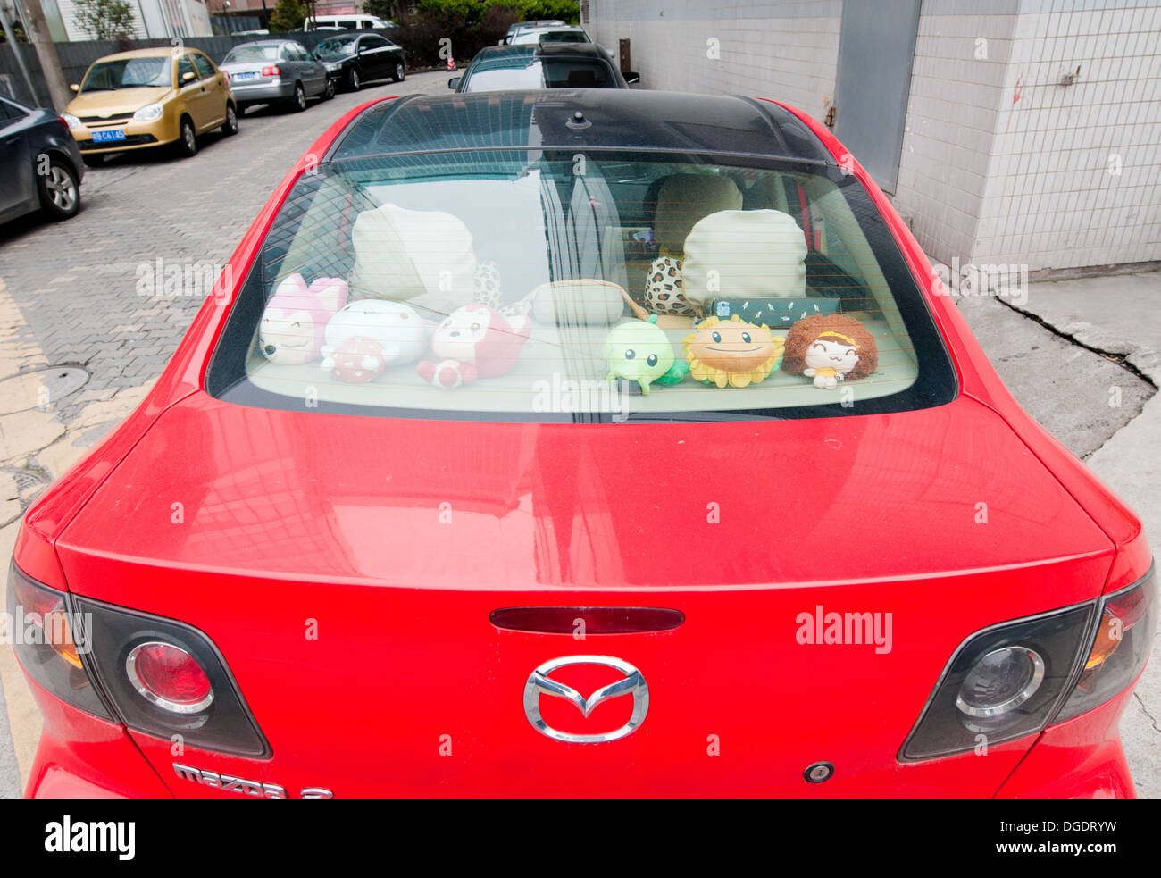 mascots in mazda sport car in Pudong District, Shanghai, China Stock Photo