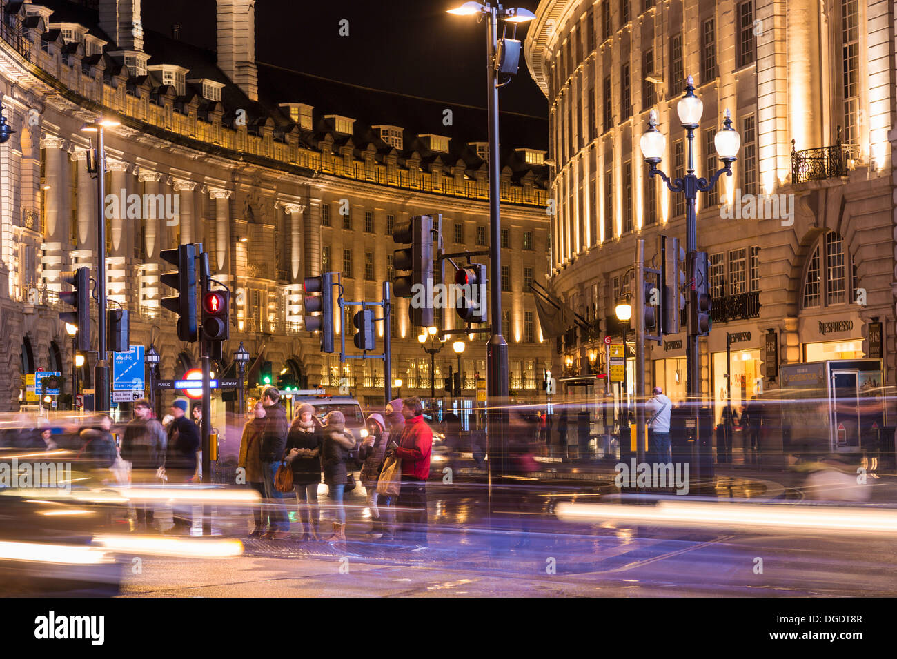 Shoppers and tourists Regent Street at night London Stock Photo