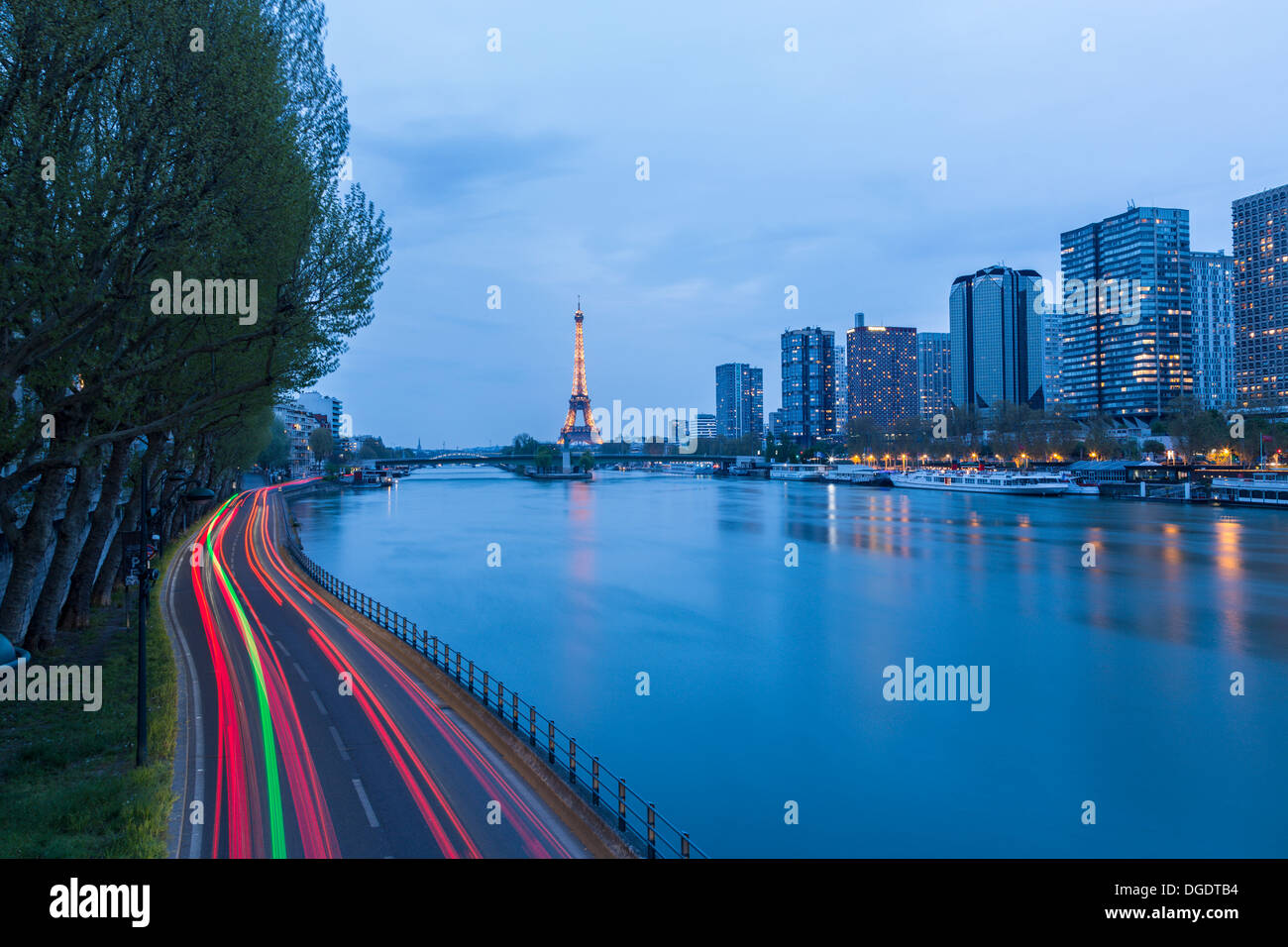 Traffic road scene with Eiffel Tower and River Seine at twilight Paris France Stock Photo