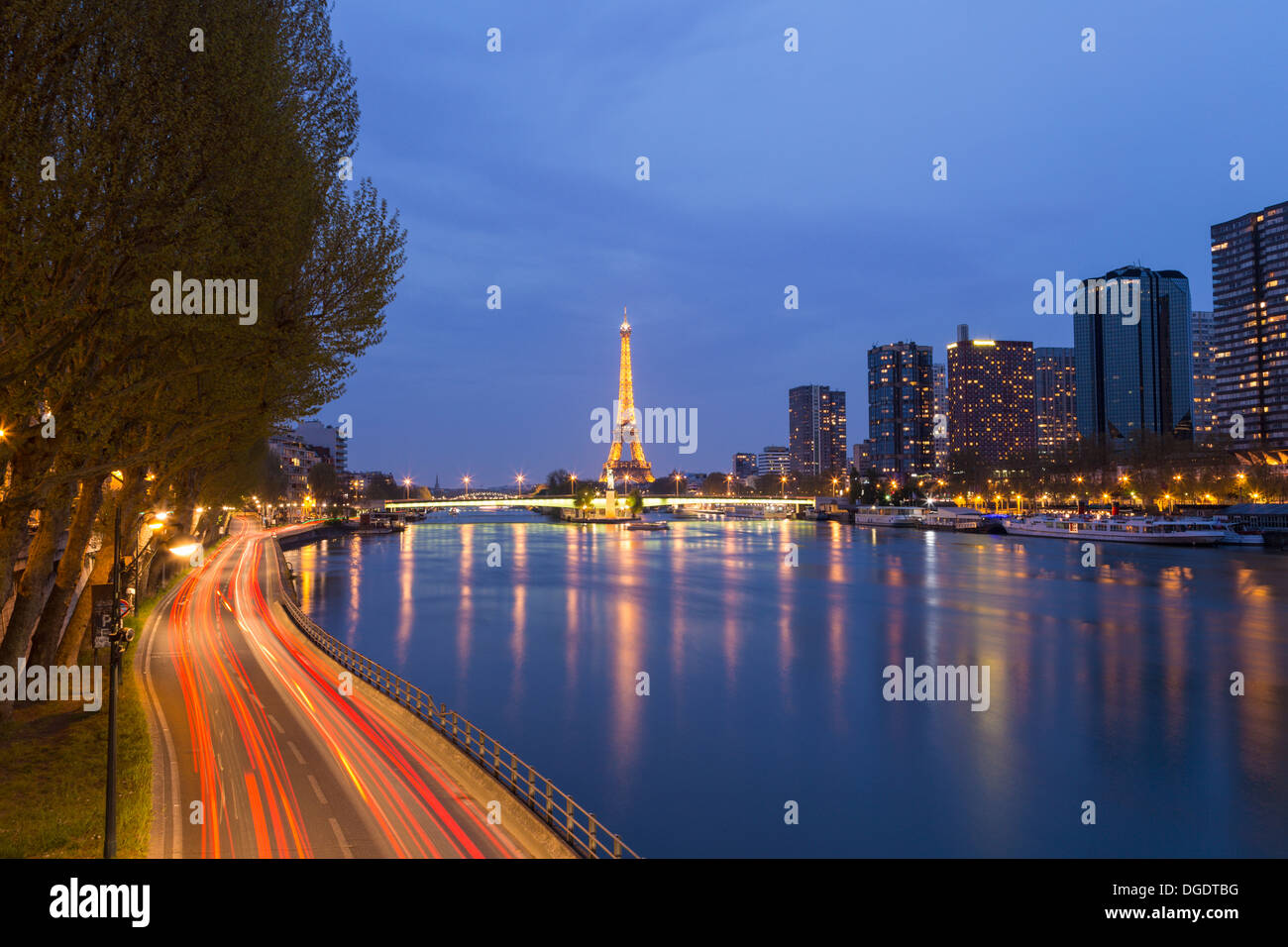 Traffic road scene with Eiffel Tower and River Seine at twilight Paris France Stock Photo