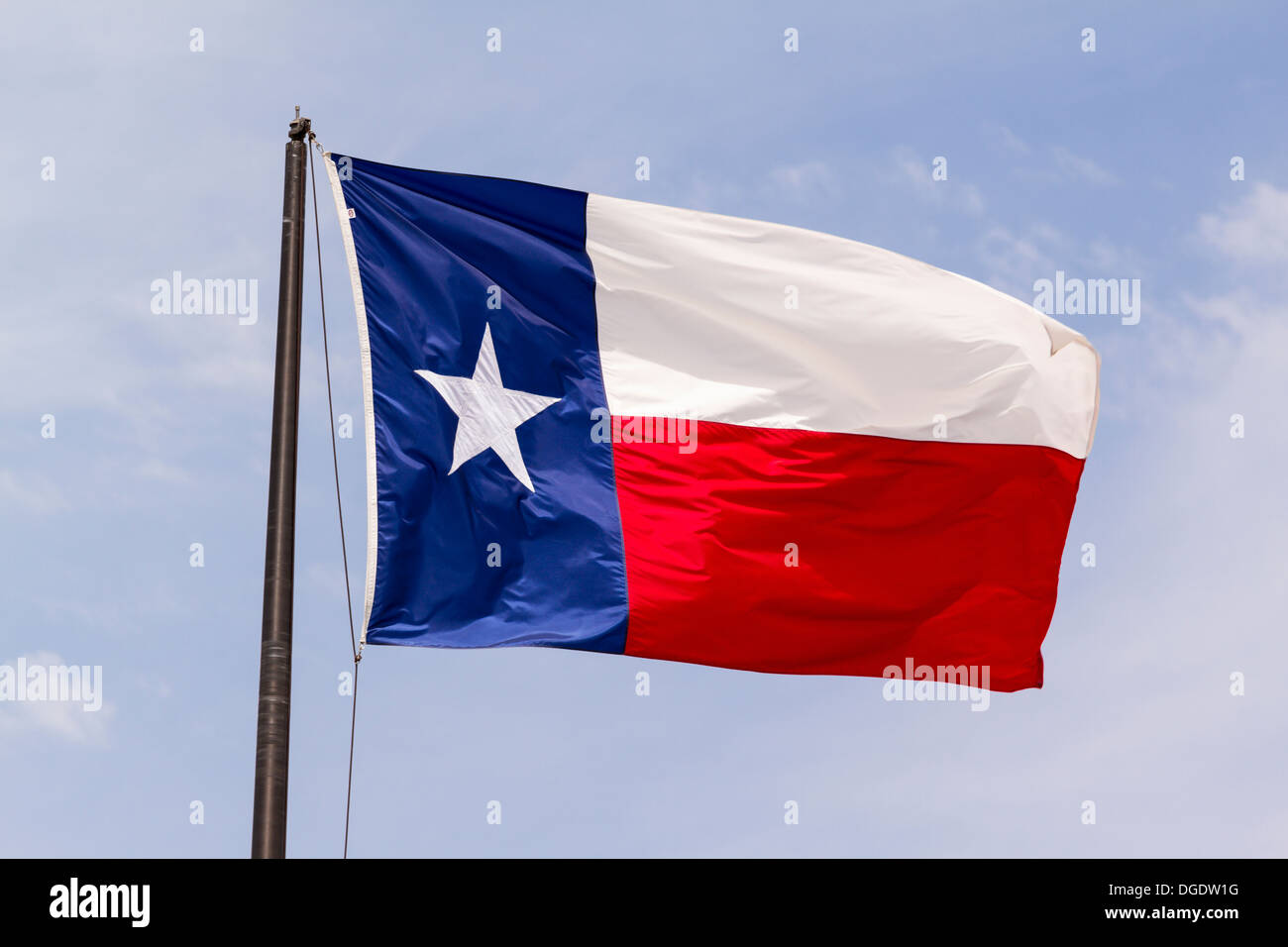 Texas flag blowing in the wind Stock Photo