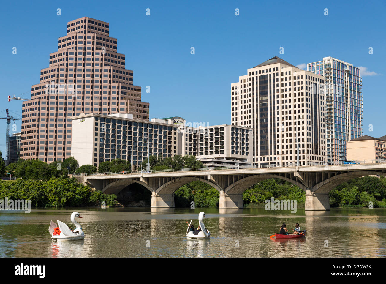 Swan boats on Lady Bird Lake Austin skyline Texas USA Stock Photo Alamy