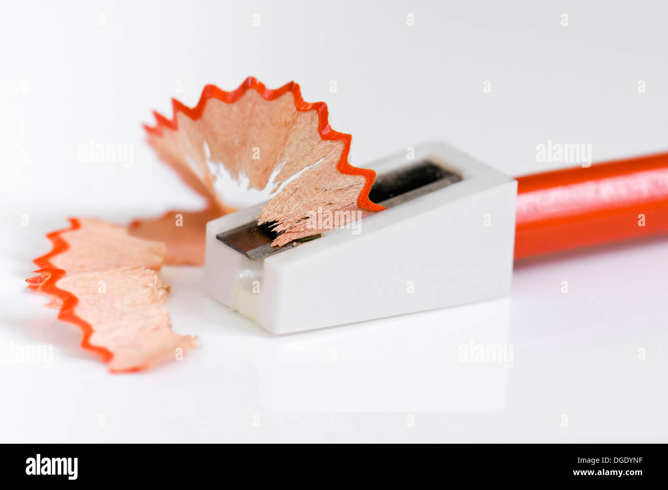 Colouring pencils with pencil shavings on old white background Stock Photo