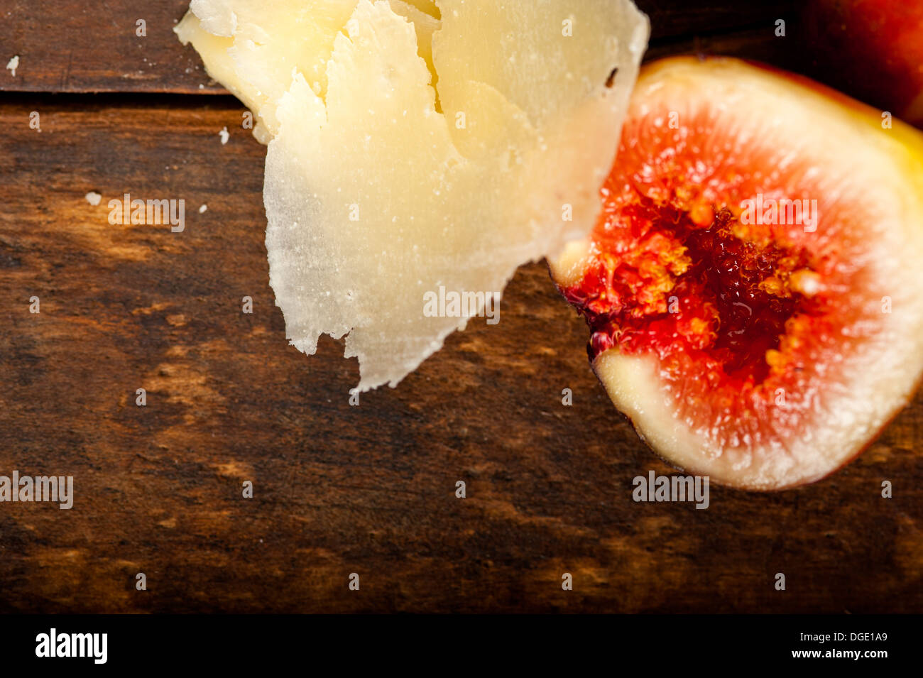 italian pecorino cheese and fresh figs macro closeup over old wood boards Stock Photo