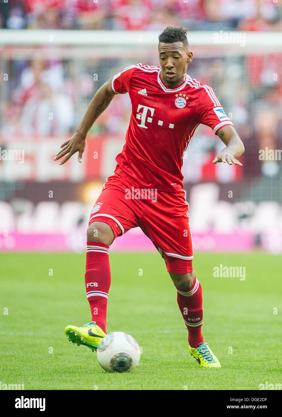 Munich, Germany. 19th Oct, 2013. Munich's Jerome Boateng plays the ball  during the Bundesliga soccer match between Bayern Munich and FSV Mainz 05  at Allianz Arena in Munich, Germany, 19 October 2013.