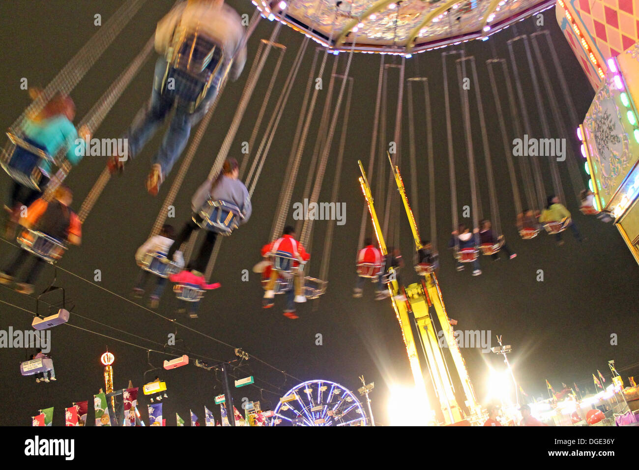 Riding the swings at the state fair Stock Photo Alamy