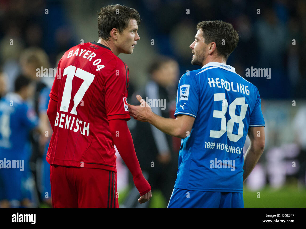 Sinsheim, Germany. 18th Oct, 2013. Hoffenheim's Kai Herdling (R) and  Leverkusen's Sebastian Boenisch debate after the Bundesliga soccer match  between 1899 Hoffenheim and Bayer Leverkusen at Rhein-Neckar-Arena in  Sinsheim, Germany, 18 October