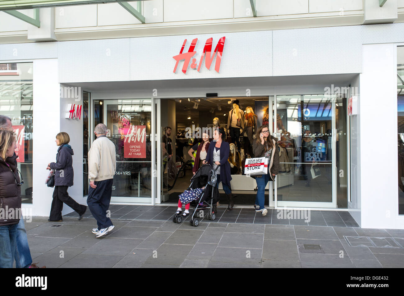 Teenage girls outside new H & M fashion store UK Stock Photo - Alamy