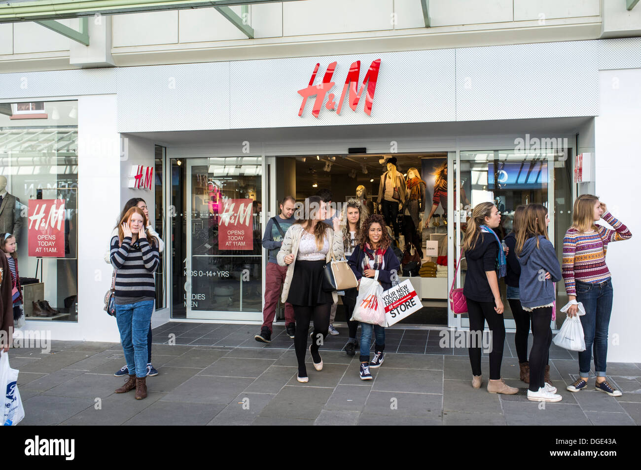 Teenage girls outside new H & M fashion store UK Stock Photo - Alamy