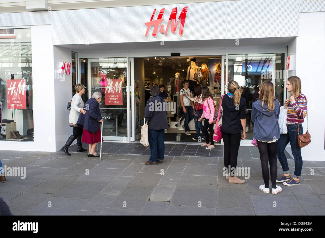 Teenage girls outside new H & M fashion store UK Stock Photo - Alamy