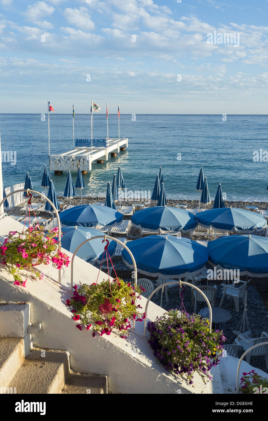 Sunbeds at Lido Plage on the main beach at Nice. Stock Photo