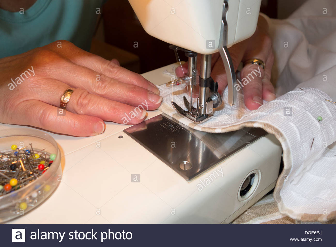 Using A Sewing Machine To Make Curtains Stock Photo 61778294 Alamy