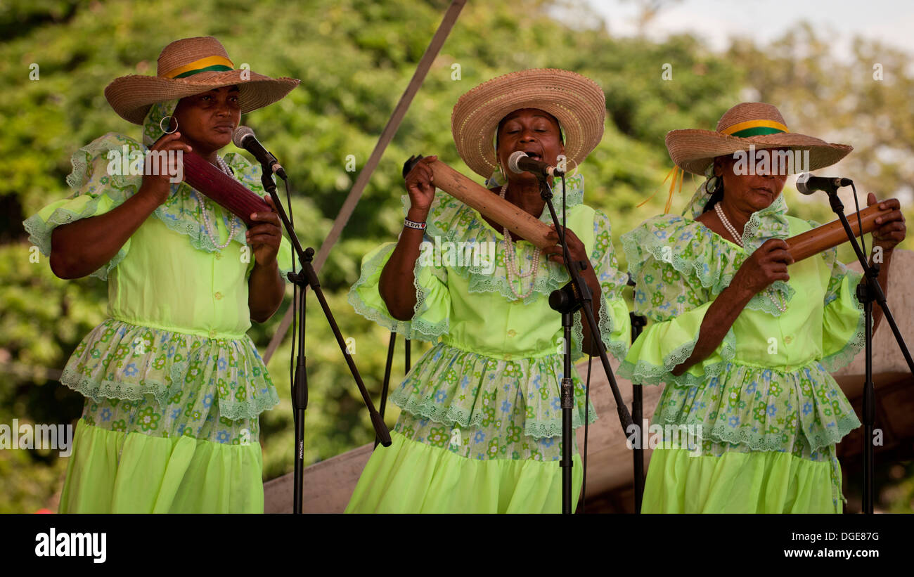 Women singing the traditional currualao en Cali Colombia at La Feria de Cali Stock Photo