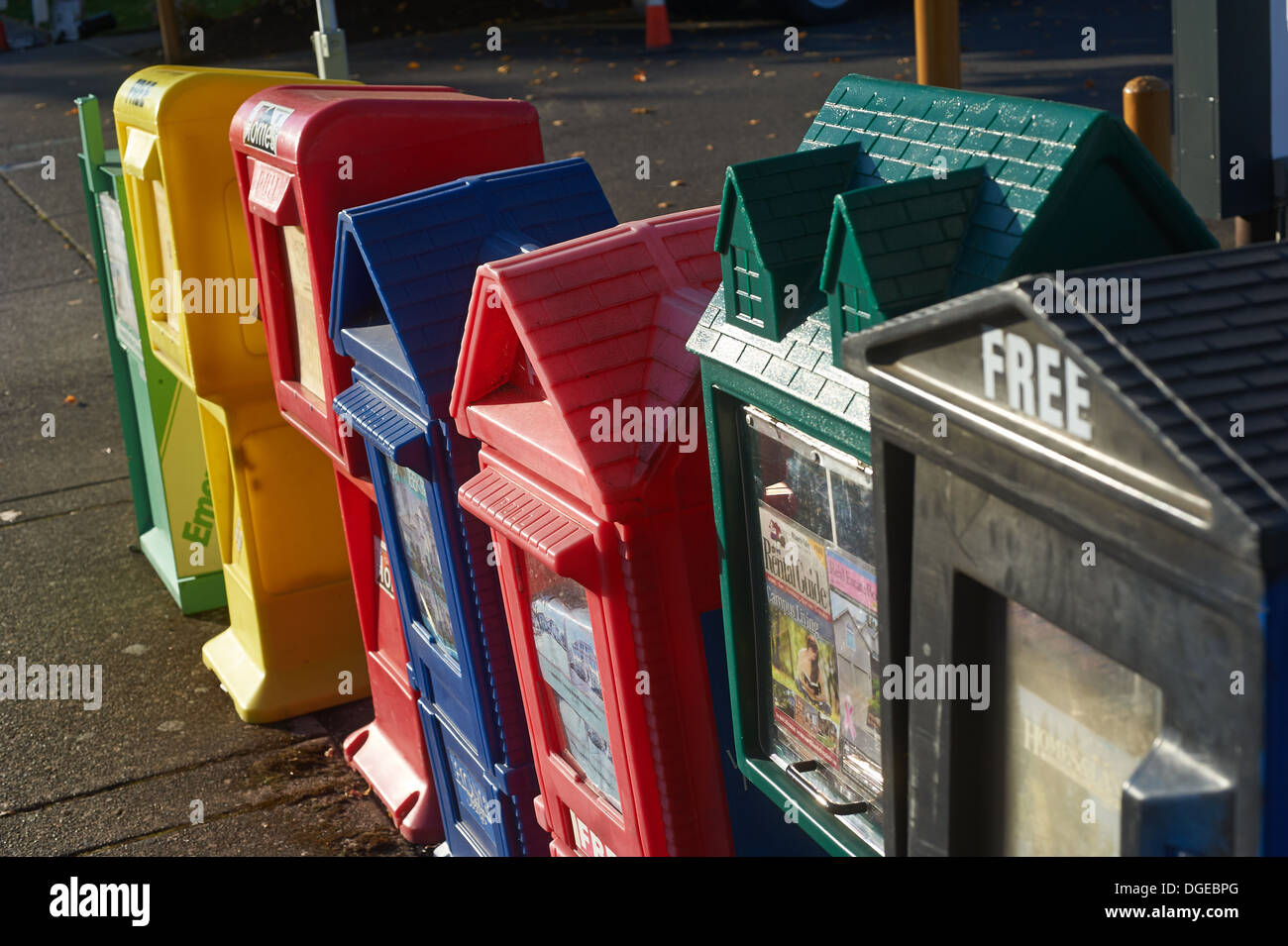 Boxes for free newspapers in downtown Stock Photo Alamy