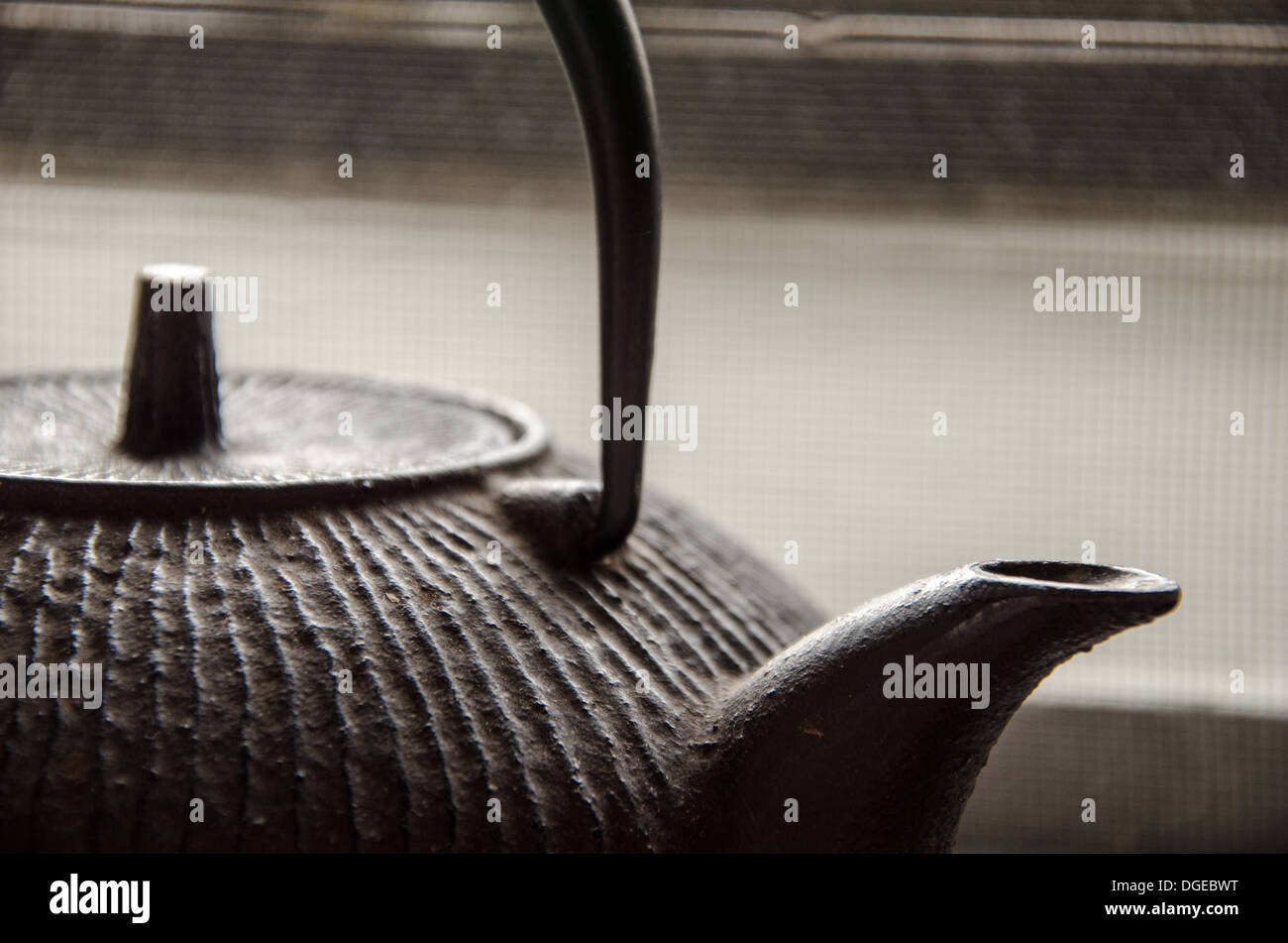 A close up shot of a cast-iron teapot. Stock Photo